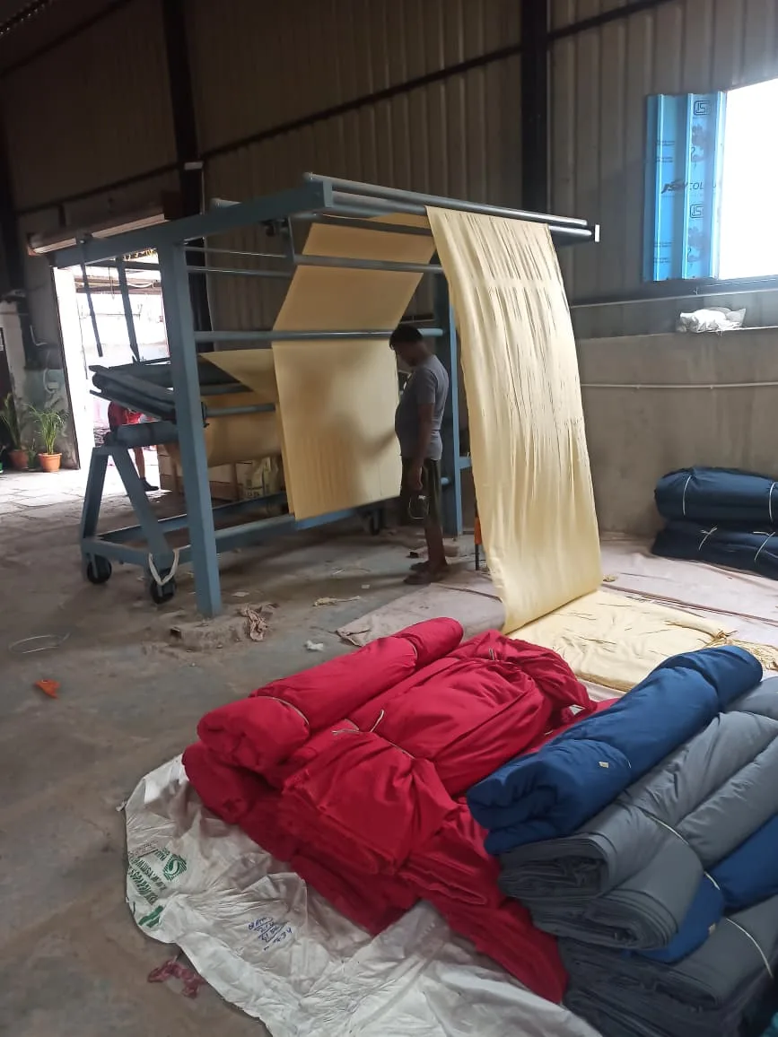 Quality control team checking fabric borders