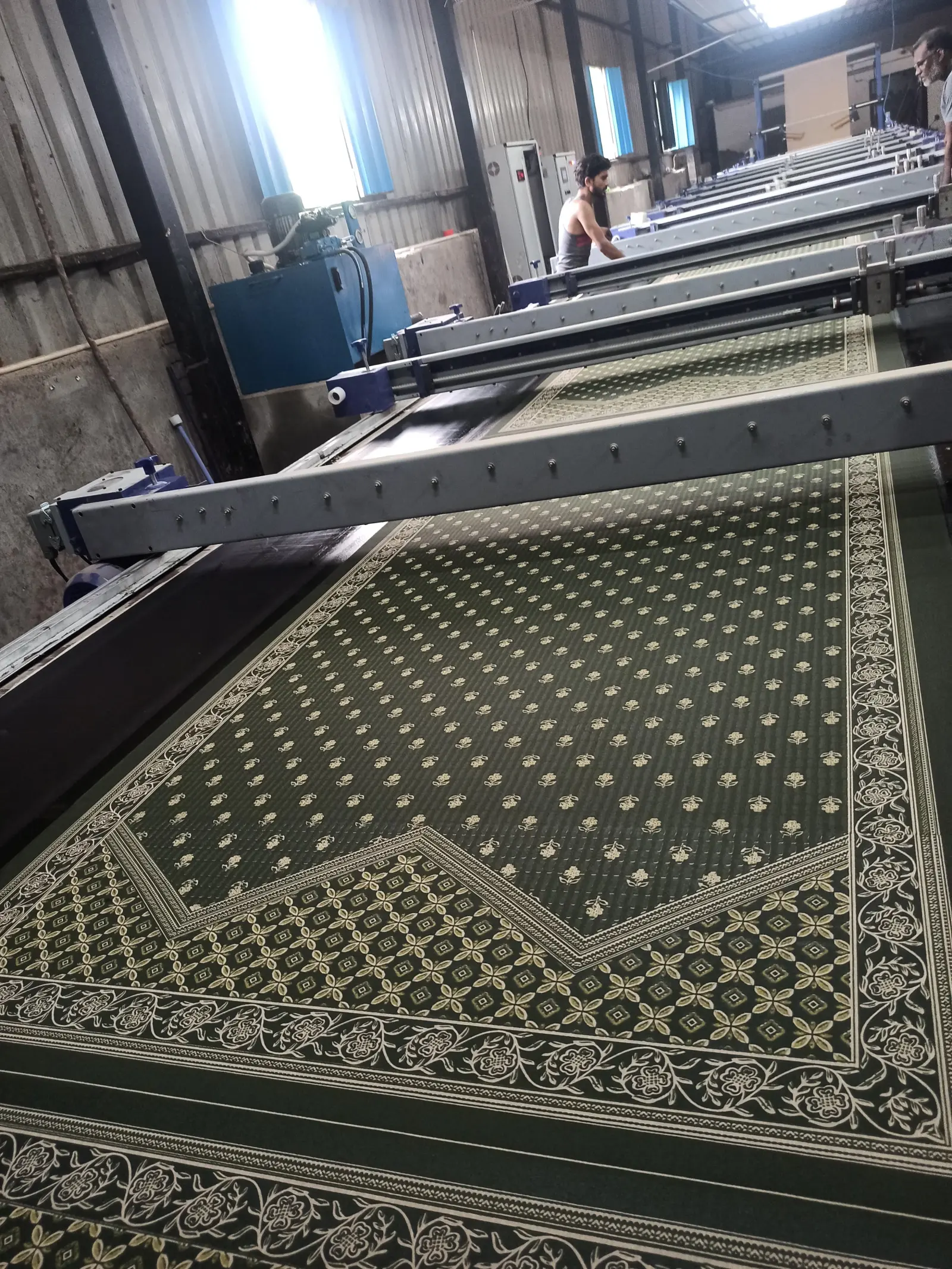 Long screen printing lines inside the Vedic Vastram factory in Shikarpura Sanganer